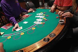 Layar antarmuka Infinite Blackjack di unit togel dengan tombol keputusan hit, stand, double